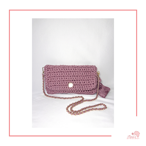 A crochet purse pattern that shows step by step on how to crochet a purse your self and attach your fabric of choice. This is a digital file. These purses are the perfect size to fit all of your small essentials such as phone, wallet, keys, makeup etc. Can be worn as an over the shoulder or cross body bag. Bag measures at about 6x10 inches when closed.   