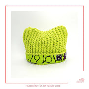Image is a crochet LIME GREEN baby hat with authentic African Ankara fabric on the rim. Perfect for keeping baby stylish, comfortable and representing culture. 
