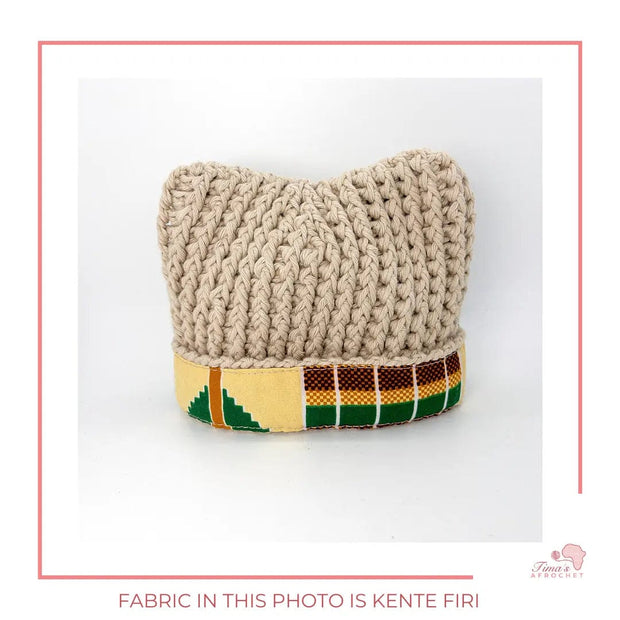 Image is a crochet light beige hat baby hat with authentic African Ankara fabric on the rim. Perfect for keeping baby stylish, comfortable and representing culture. 