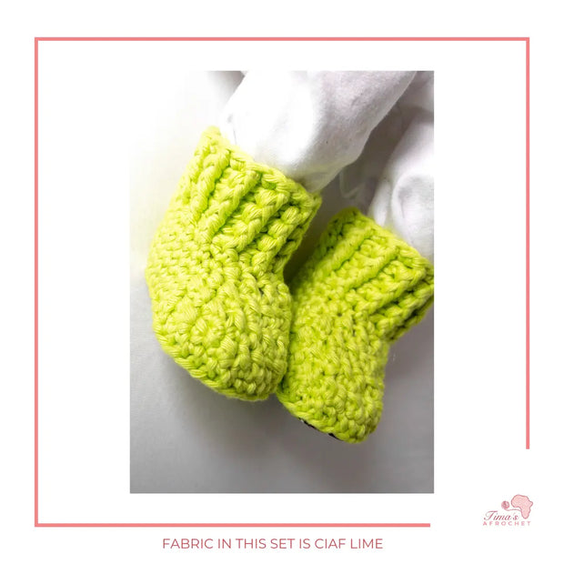 Image is a pair of crochet LIME GREEN baby shoes with a white bow and authentic African Ankara  fabric on the soles. Perfect for keeping baby stylish, comfortable and representing culture.