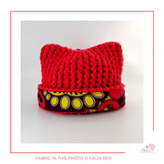 Image is a crochet red  baby hat with authentic African Ankara fabric on the rim. Perfect for keeping baby stylish, comfortable and representing culture. 