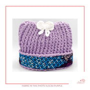 Image is a crochet light purple baby hat with authentic African Ankara fabric on the rim. Perfect for keeping baby stylish, comfortable and representing culture. 