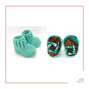 Image is a pair of crochet light purple baby shoes with a white bow and authentic African Ankara  fabric on the soles. Perfect for keeping baby stylish, comfortable and representing culture.