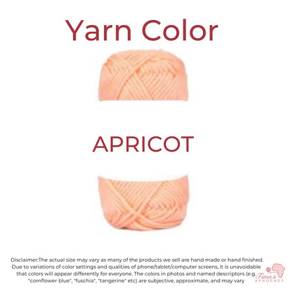 Image is a ball of peach color yarn